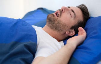 Man with sleep apnea sleeping